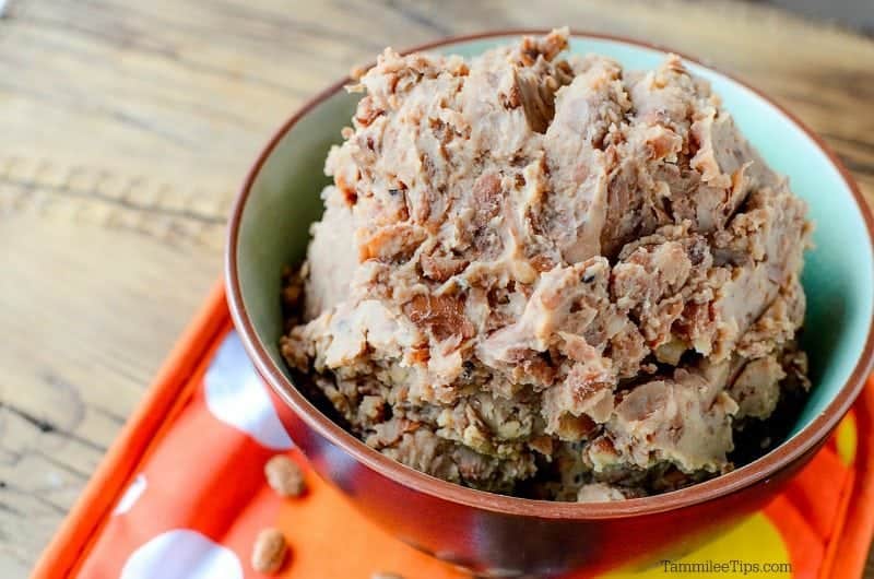 refried beans in a bowl on a colorful place mat