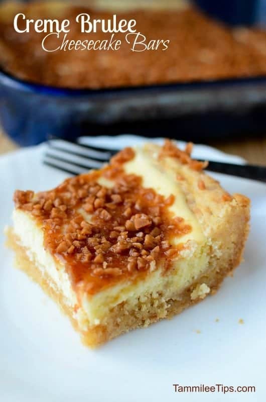 Creme Brulé Cheesecake Bars text over a square cookie bar on a white plate