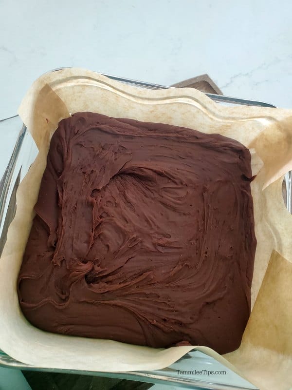 Carnation Famous chocolate fudge in a parchment lined baking dish