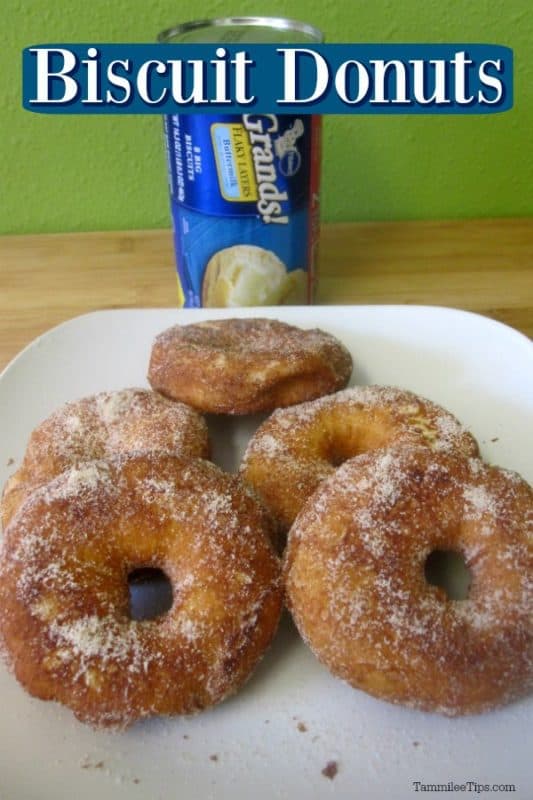Biscuit Donuts over a plate of donuts and a can of grands biscuits