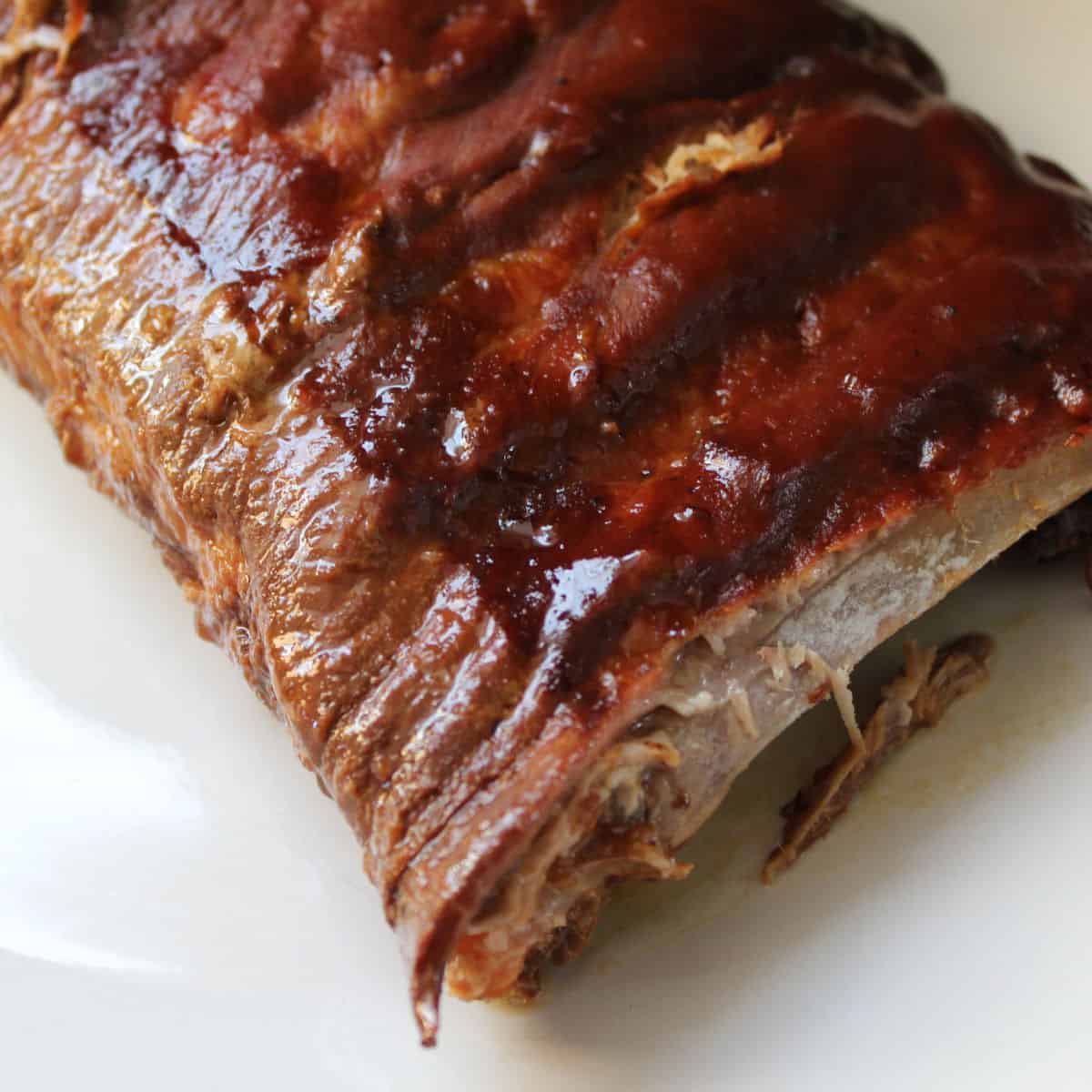 slow cooker ribs on a white plate