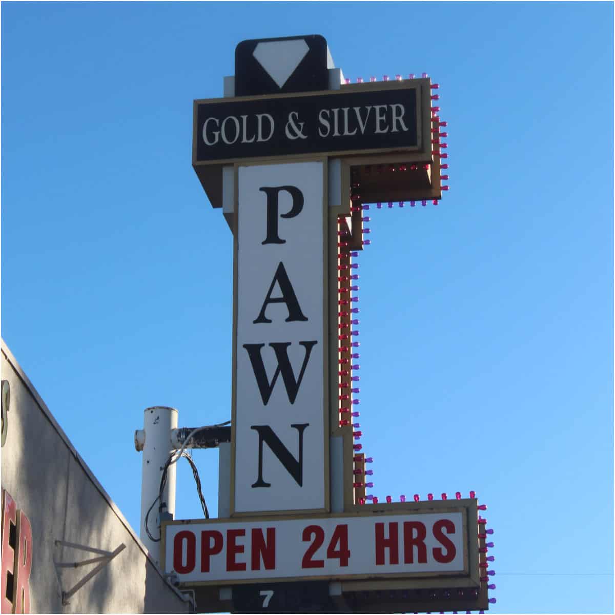 Gold & Silver Pawn Open 24 Hours sign
