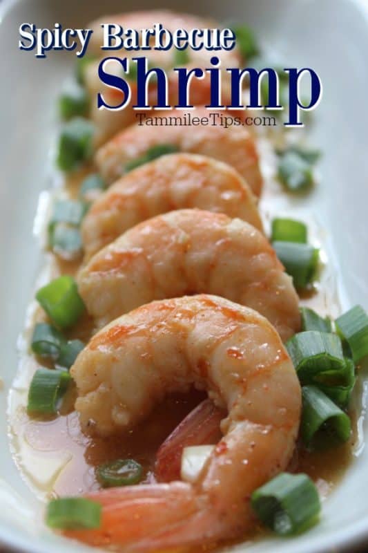 Spicy Barbecue Shrimp over a platter of shrimp and green onions