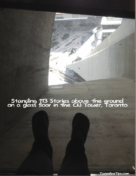 Standing on the CN Tower glass Floor