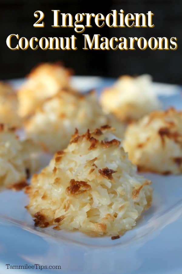 coconut macaroons on a white plate with a black background