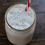 Dunkin Donuts Coffee Coolatta in a mason jar with a striped straw