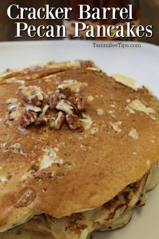 Cracker Barrel Pecan Pancakes over a stack of pancakes on a white plate