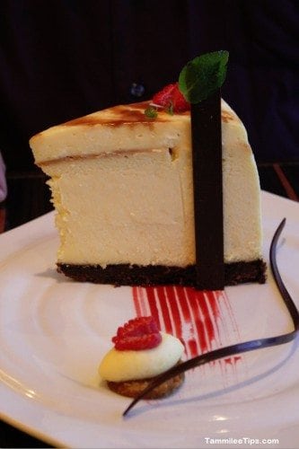 Carnival Breeze Fahrenheit 555 Steakhouse Cheesecake on a white plate