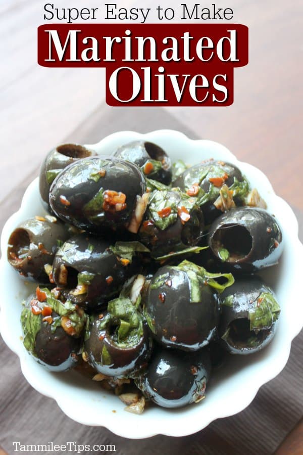 Super easy to make Marinated Olives text over a white bowl with black olives and seasoning