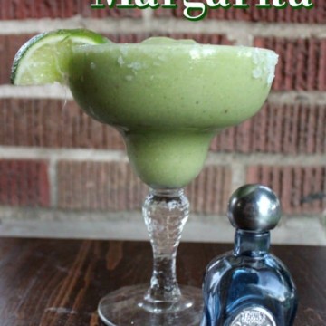 Avocado Margarita text printed over a margarita glass and small tequila bottle