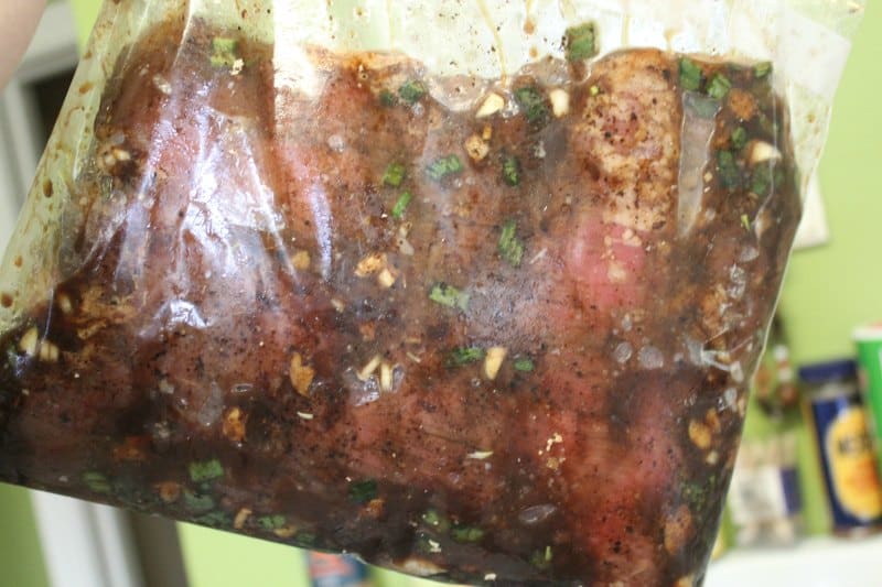 Asian flank steak marinating in a Ziploc bag