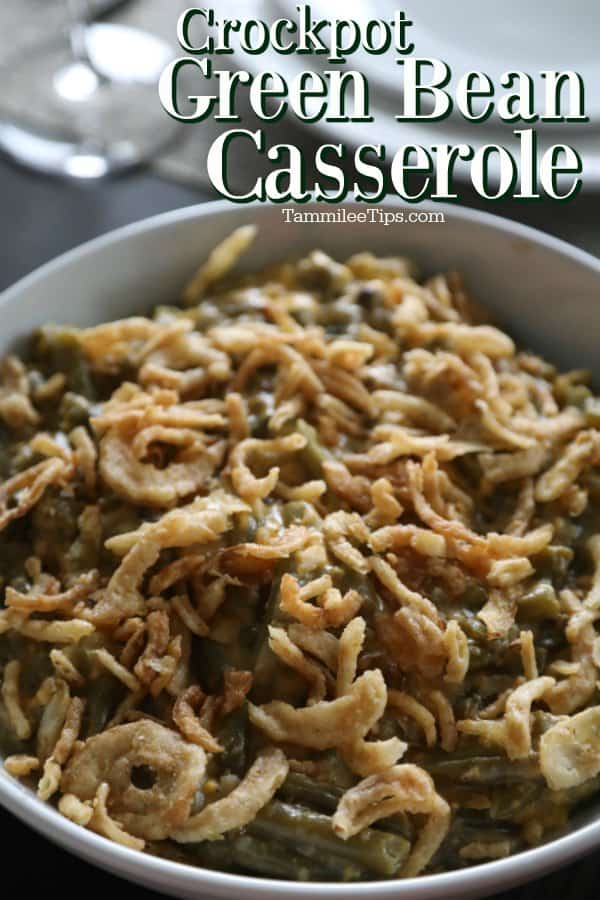 Crockpot green bean casserole text over a bowl of green beans with fried onions
