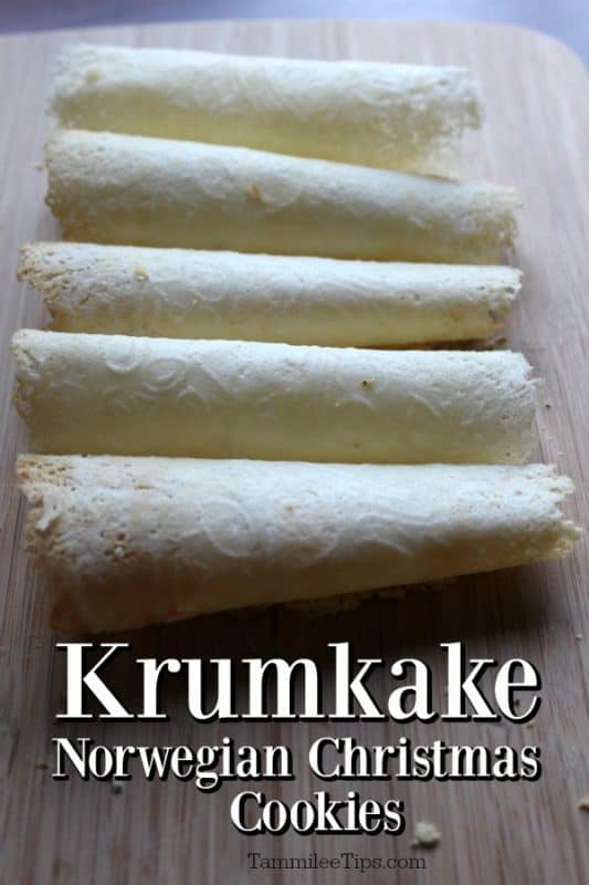 Krumkake Norwegian Christmas Cookies under krumkake lined up on a wooden board. 