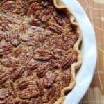 Pumpkin Pecan Pie in a white pie dish