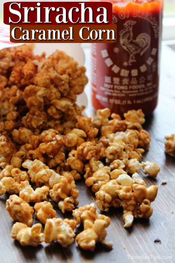 Sriracha Caramel corn over a pile of popcorn and a bottle of Sriracha hot sauce