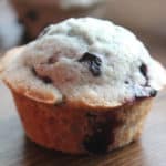 blueberry muffin on a wood board
