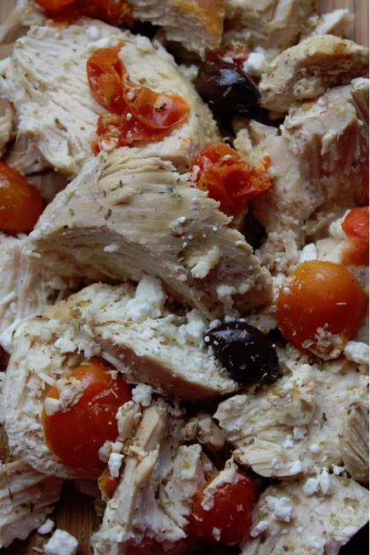 Close up of greek chicken with tomatoes and kalamata olives