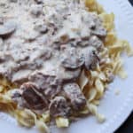 crockpot garlic beef stroganoff on a white plate