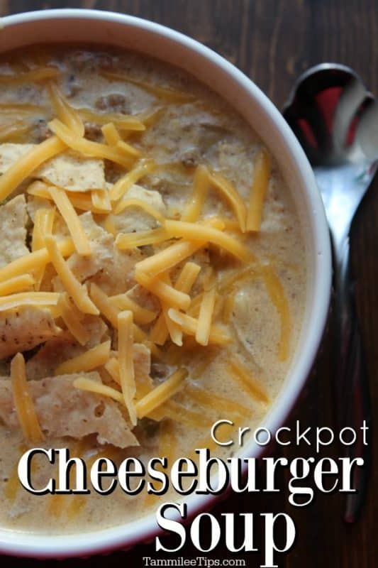 Crockpot cheeseburger soup under a white bowl with soup and a silver spoon