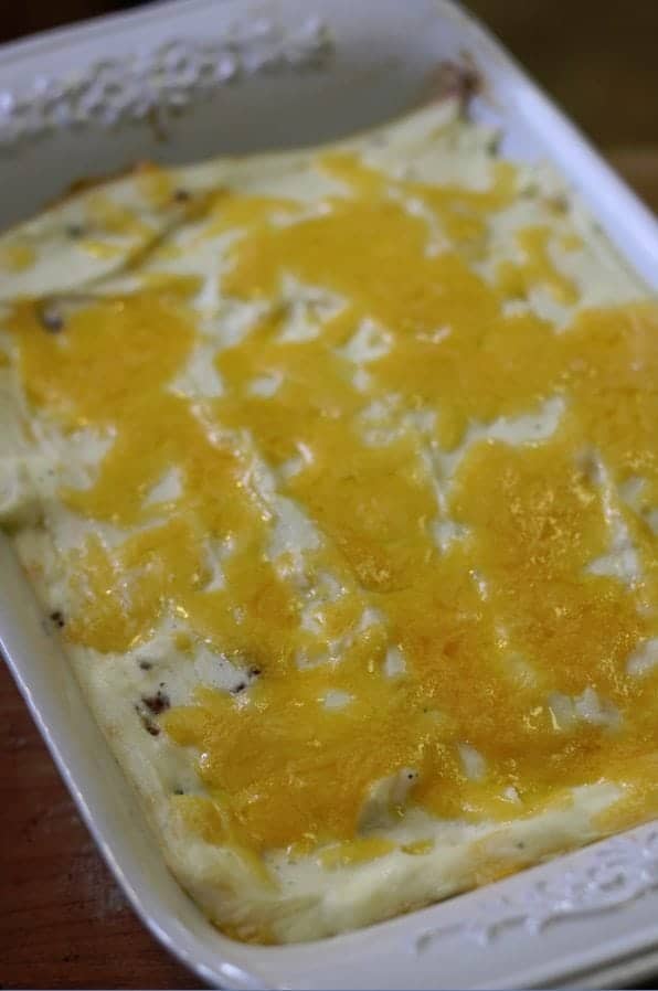 Super easy shepherd's pie just out of the oven in a white baking dish