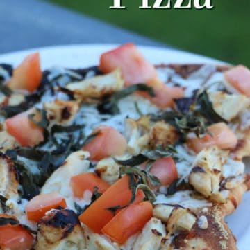 Chicken Bruschetta Pizza text over a white plate with pizza