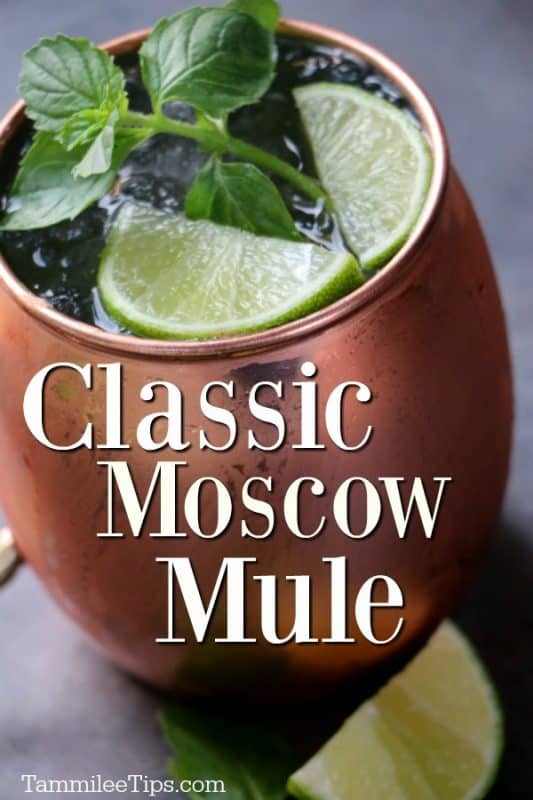 Classic Moscow Mule text written across a copper mug with a Moscow Mule drink, 2 lime wedges, and mint