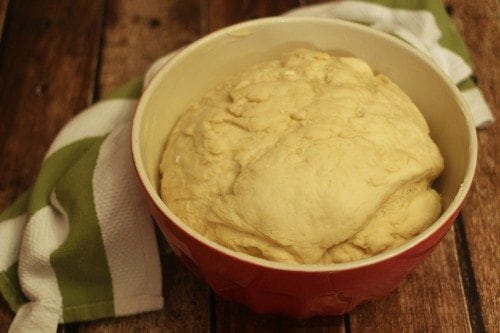 Dough After Rising in a red bowl