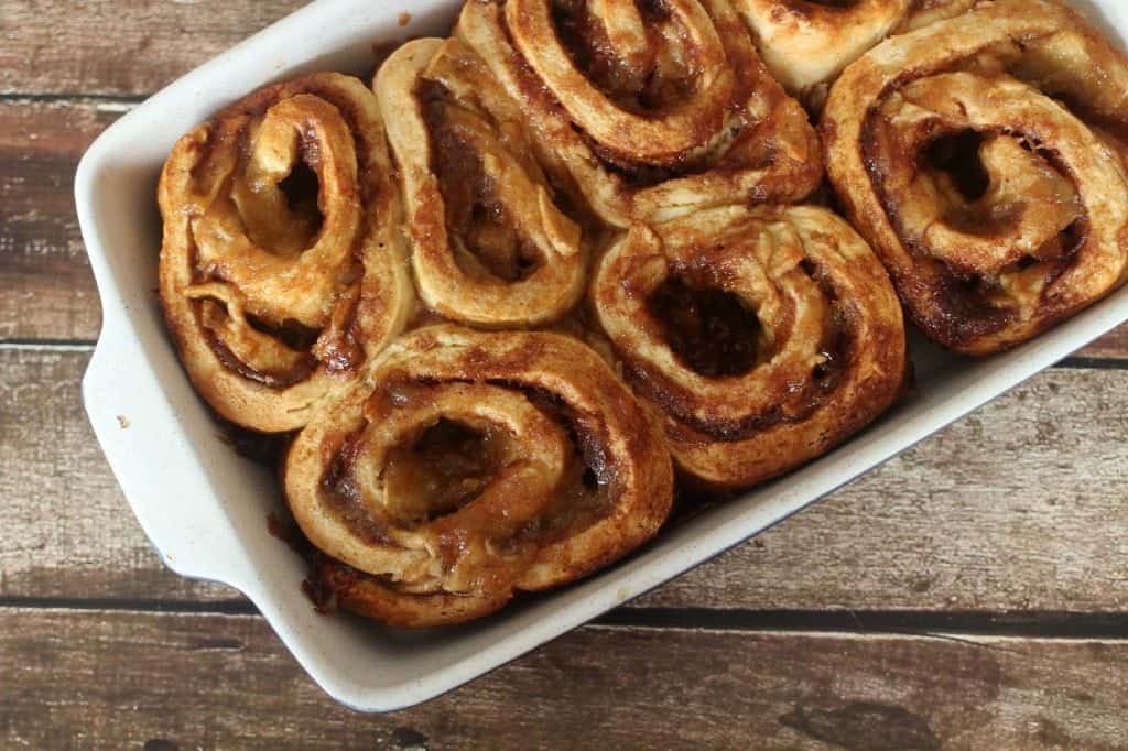 Homemade Apple Cinnamon Rolls Before Oven in a white baking dish