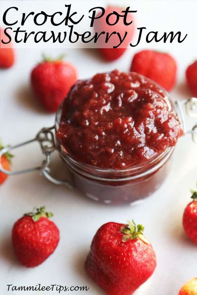 Crockpot Strawberry Jam text printed over a glass jar with jam and fresh strawberries