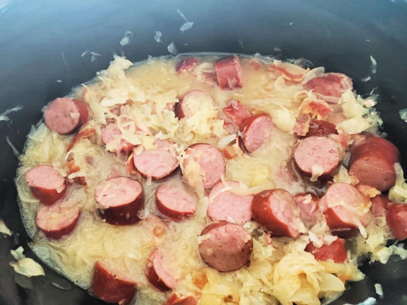 sauerkraut and kielbasa pork sausage in a slow cooker