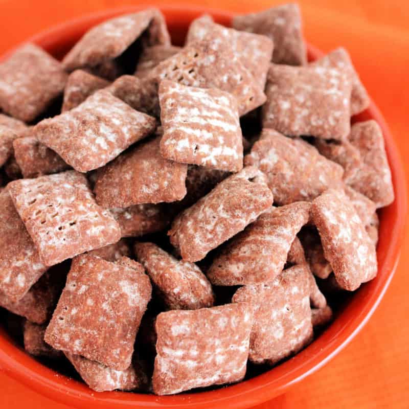 Chocolate Peanut Butter Muddy Buddies in a bowl