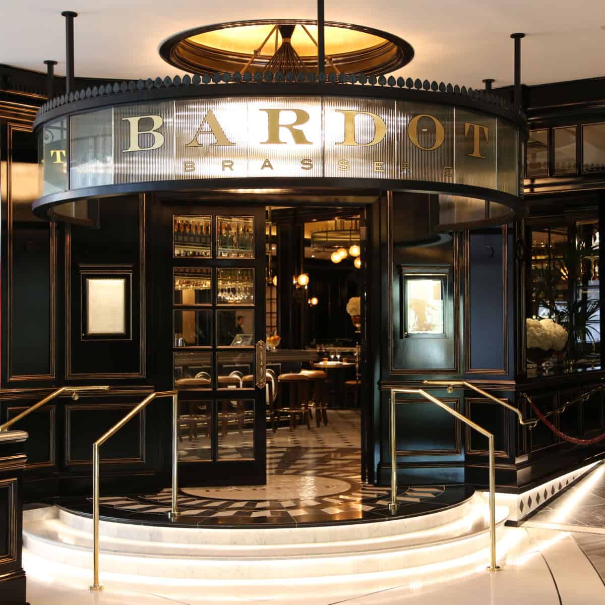 Entrance to Bardot Brasserie with marble stairs