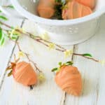 Easter Carrot Strawberries next to a white bowl