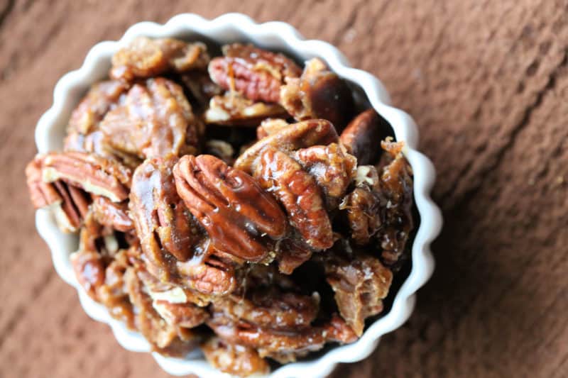 Guinness Nuts in a white bowl on a brown napkin