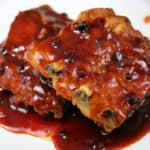 huckleberry BBQ sauce ribs on a white plate