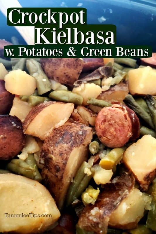 Crockpot Kielbasa potatoes and green beans in a dark slow cooker bowl