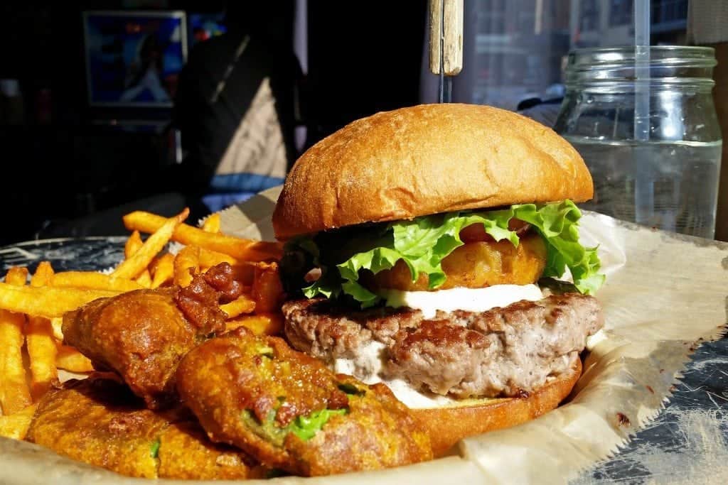 Stella's burger with deep fried avacados