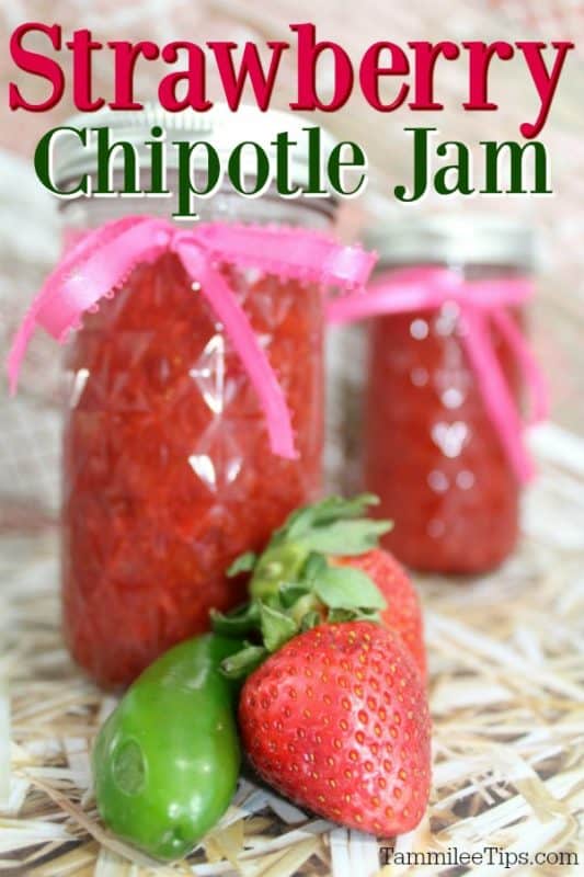 Strawberry Chipotle jam over jars of jam with a pepper and fresh strawberries