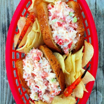 easy crab sliders in a red plastic container with potato chips