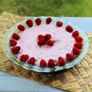 Raspberry No Bake Pie in a glass pie dish
