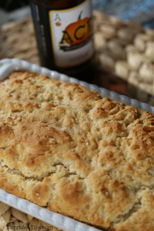 Pumpkin beer bread in a white baking dish. 