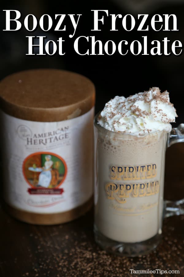 boozy frozen hot chocolate text over a glass mug filled and garnished with whipped cream