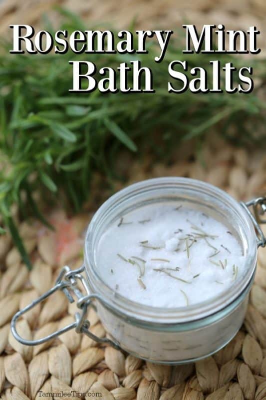 Rosemary Mint Bath Salts over a glass container filled with bath salts
