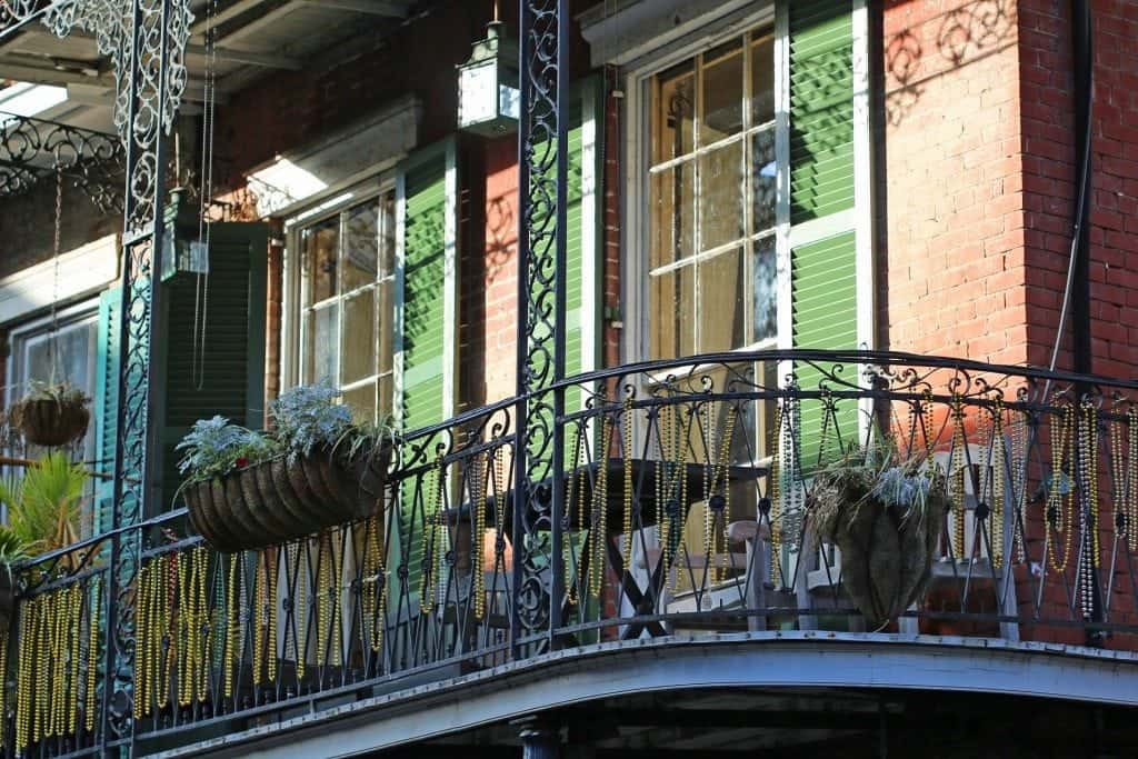 beads on deck railing French Quarter New Orleans