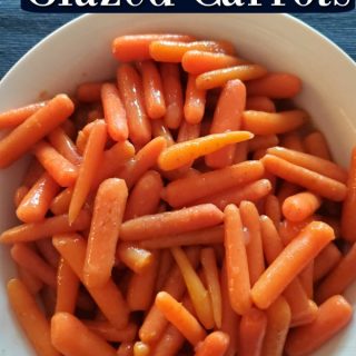 Crockpot glazed carrots text over a white bowl with baby carrots