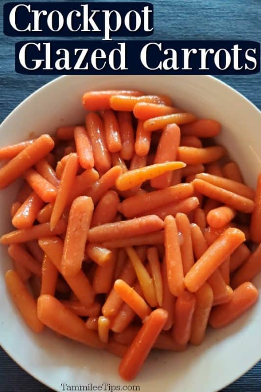 Crockpot glazed carrots in a white bowl on a blue tablecloth