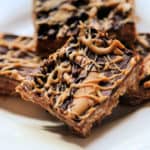 No Bake Chocolate Oatmeal Bars piled on a white plate