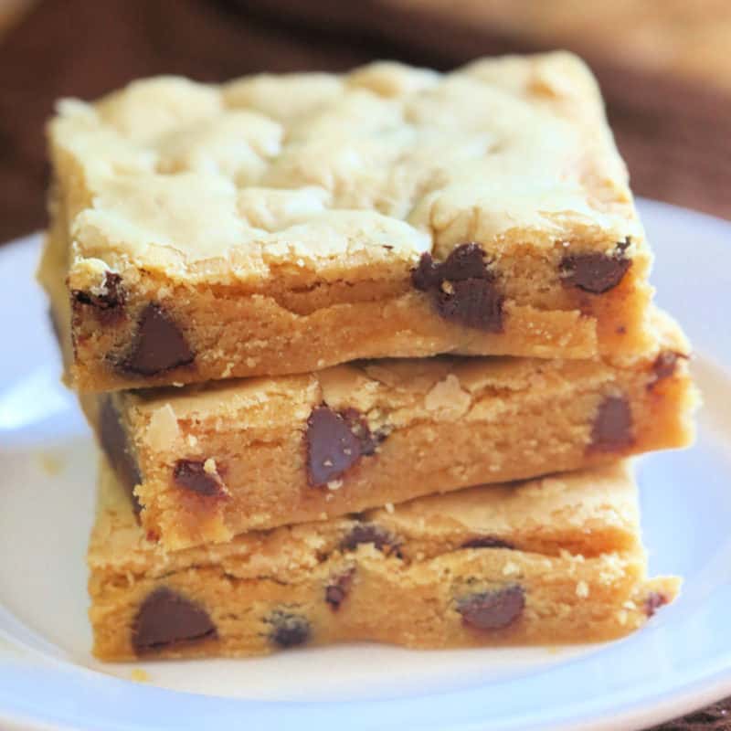 Chocolate Peanut Butter Cake Mix Cookie Bars stacked on a white plate