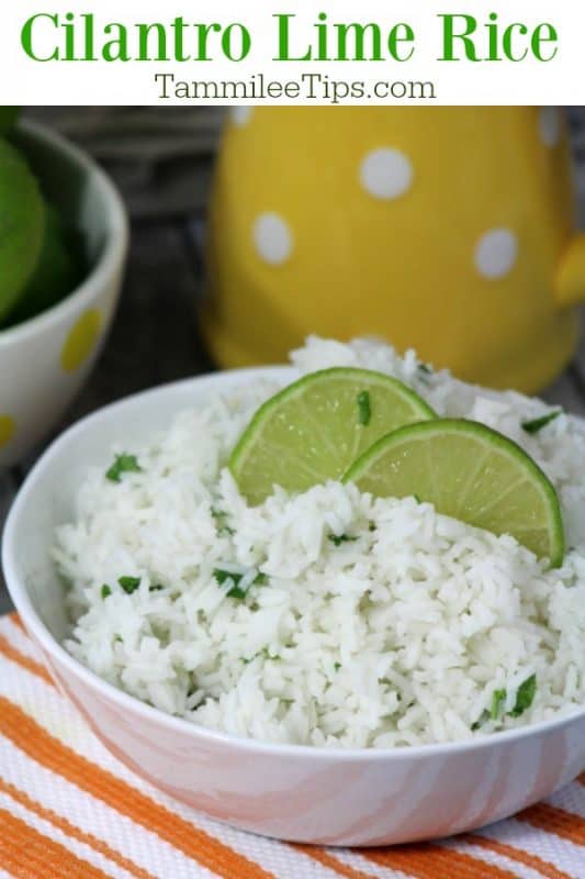 Cilantro Lime Rice in a white bowl with lime wedges. 