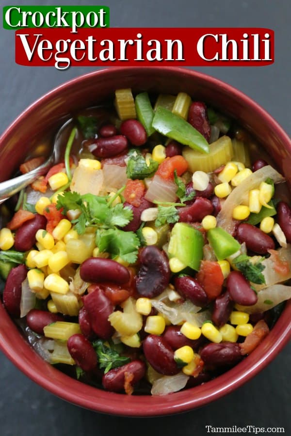 Crockpot Vegetarian Chili text over a red bowl with beans avocado and corn
